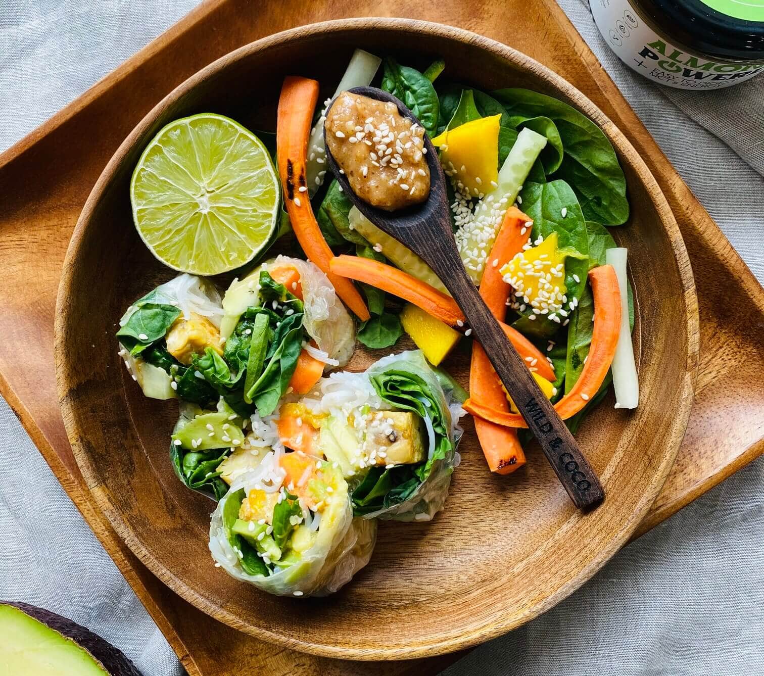 Spring avocado and mango rolls with almond Power dip